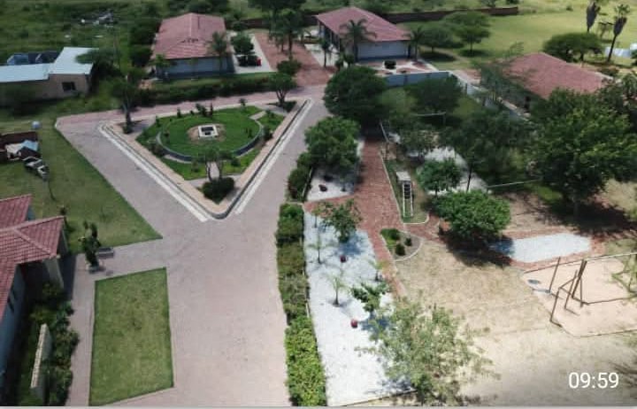 Aerial view of buildings and central gardens