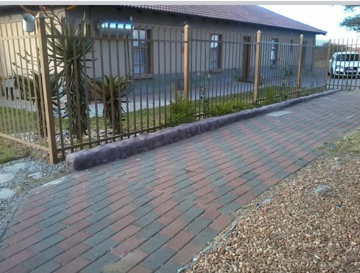 Exterior paved area with secure fencing