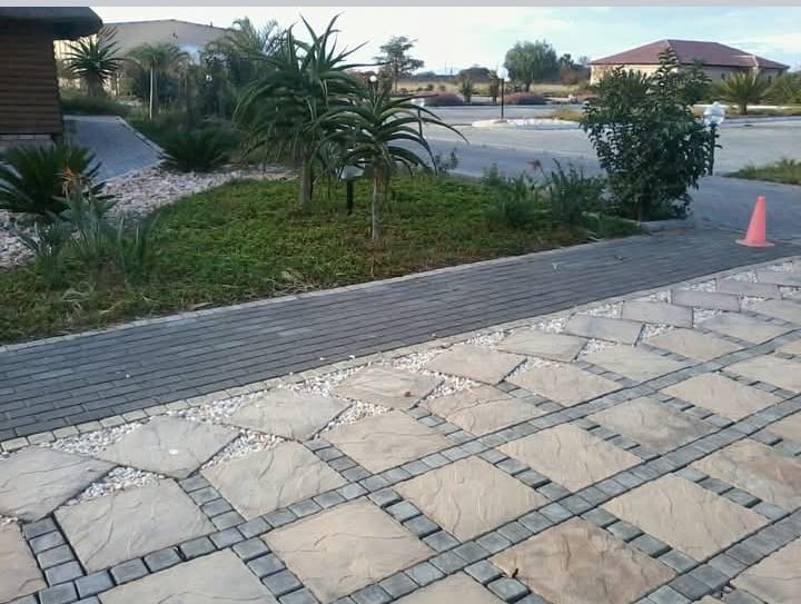 Patterned stone walkway through the estate